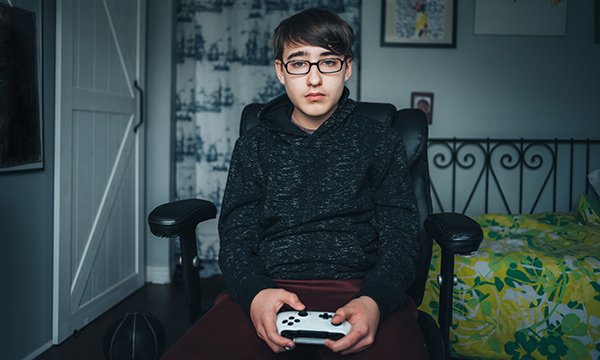 Picture shows a teenager playing videogames in his bedroom. A new NHS clinic with specialist mental health nurses will help young people addicted to gaming.