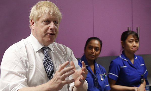 Prime minister Boris Johnson talking to nurses during 2019 election campaign