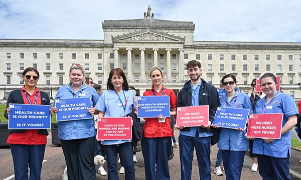 Photo of nurses protesting about nurse training cuts outside Stormont in Belfast