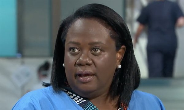 Equality 4 Black Nurses chief executive Neomi Bennett being interviewed on ITV