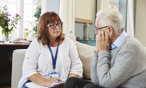 Photo of mental health nurse talking with patient