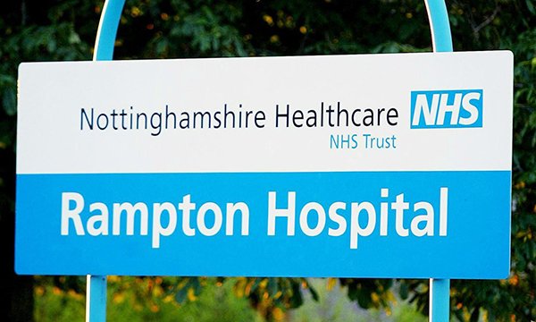 Sign outside building saying Rampton Hospital, part of Nottinghamshire Healthcare NHS Trust