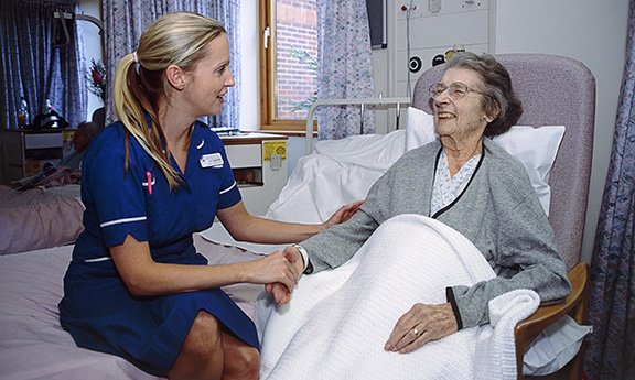 Nurse advises a patient