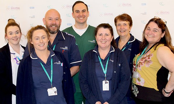 Picture of members of a nurse-led digital health service who use a video link to triage older people in care and nursing homes, avoiding unnecessary admissions to the emergency department.