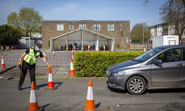 Image shows social distancing cones being put in place at general practice car park,
