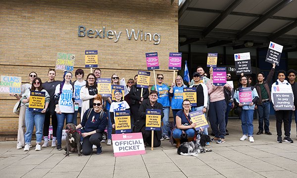 RCN members on strike and holding placards outside Bexley Wing at St James’s Hospital, Leeds 
