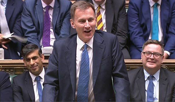 Photo of chancellor Jeremy Hunt delivering his autumn statement, illustrating story about no new money for NHS in budget