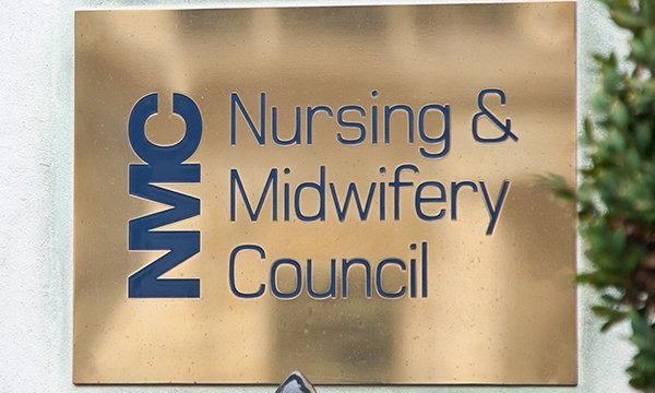 NMC headquarters brass plaque showing its name and logo. A nurse who looked up medical records with no legitimate reason was suspended by the regulator